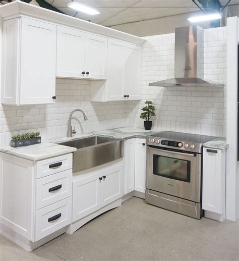 white shaker cabinets with stainless steel appliances|countertops with white shaker cabinets.